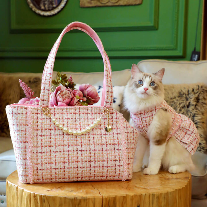 Luxury tweed checkered pet carrier bag for small dog, elegant and durable travel accessory.