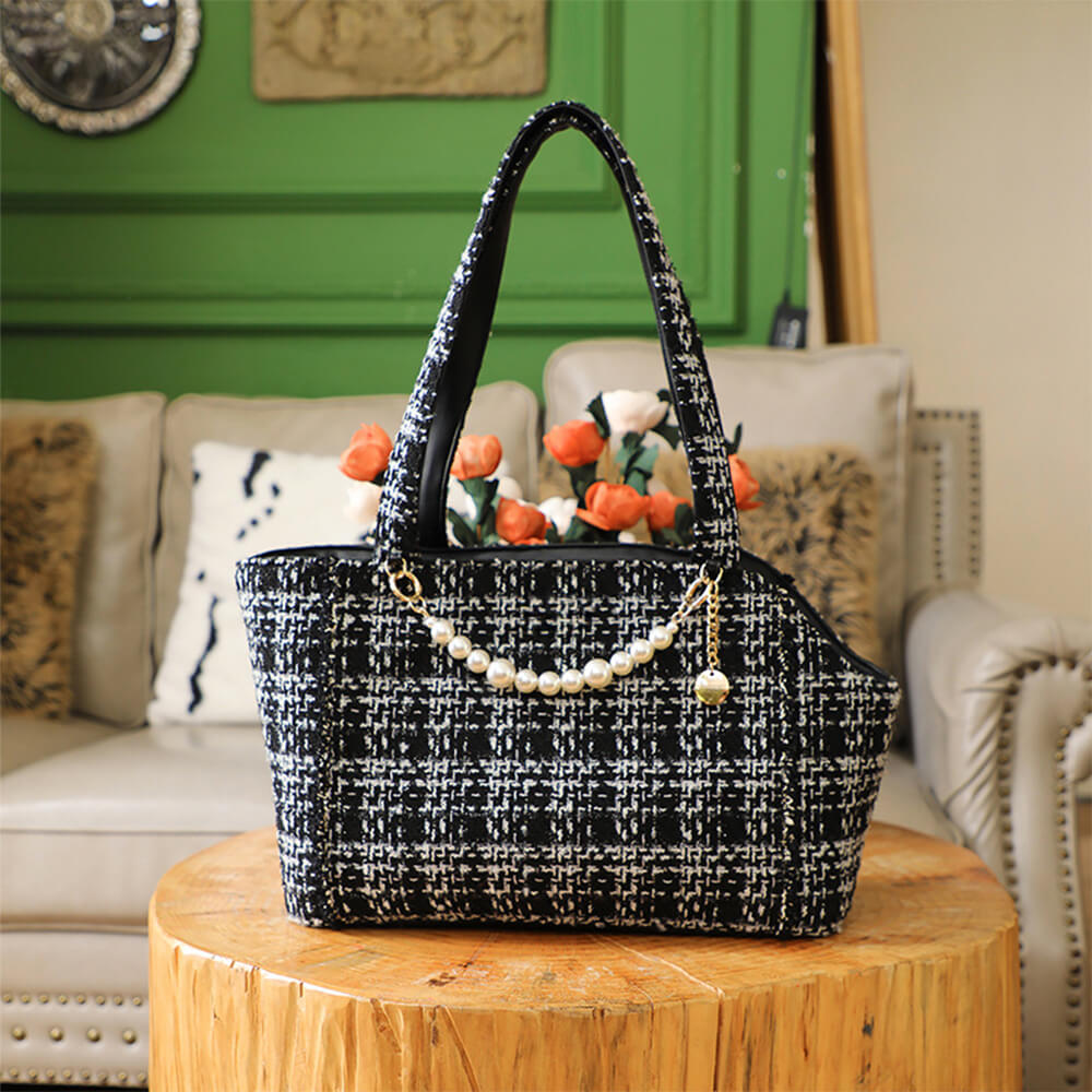 Premium quality tweed checkered pet carrier bag, ideal for dog comfort during travel.