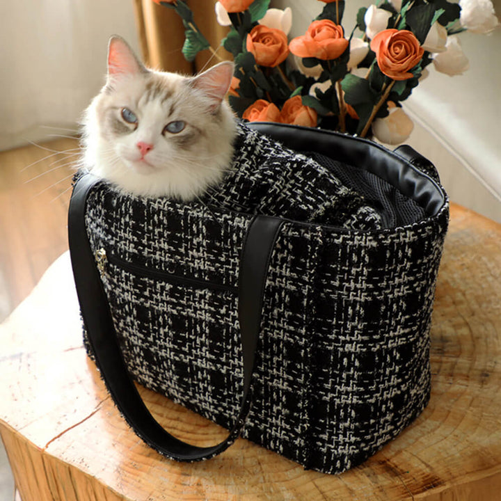 High-end small pet carrier, tweed material, comfortable padding & ventilation for travel.