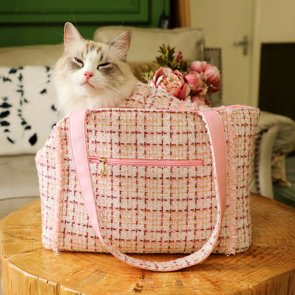 Stylish tweed pet carrier for small dogs, secure zipper, breathable windows, fashion pet accessory.