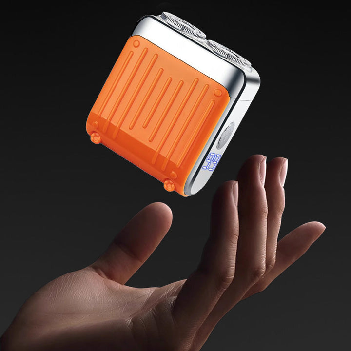 "Magnetischer Rasierer mit grauer Oberfläche, kompakt und leicht, ideal für ultraglattes, hautschonendes Rasieren."