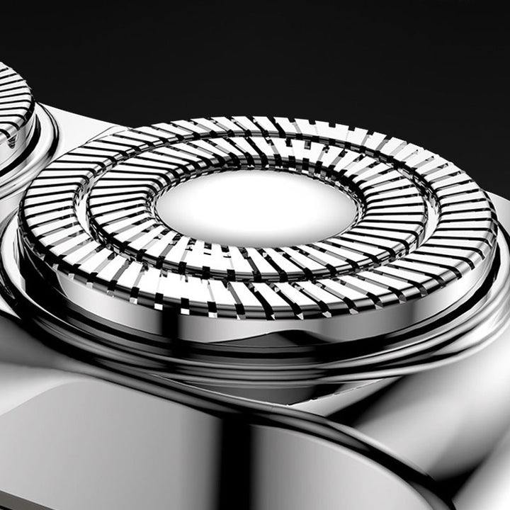 "Magnetischer Rasierer mit grauer Oberfläche, kompakt und leicht, ideal für ultraglattes, hautschonendes Rasieren."