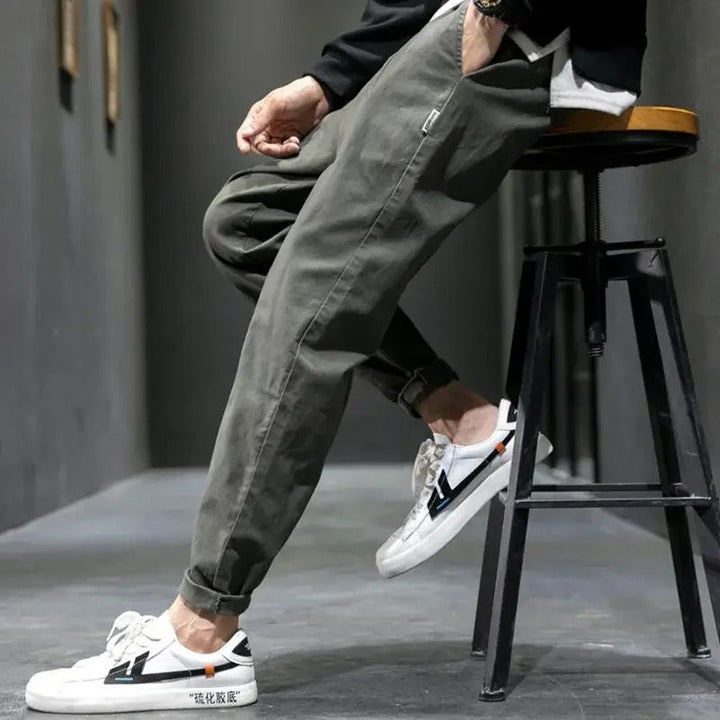 Black tapered joggers for men, designed for ultimate comfort and versatile everyday fashion.
