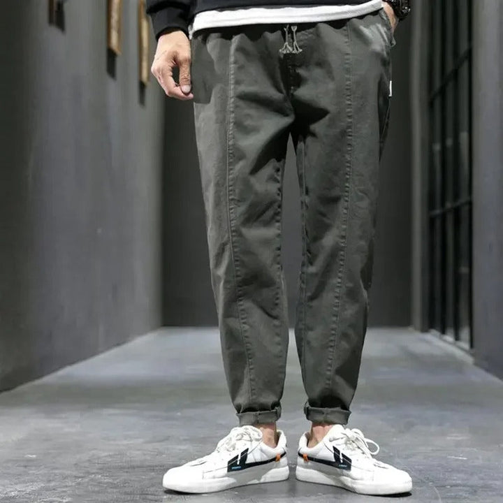 Men's athletic tapered pants, offering ultimate comfort and a modern, stylish look for activewear.