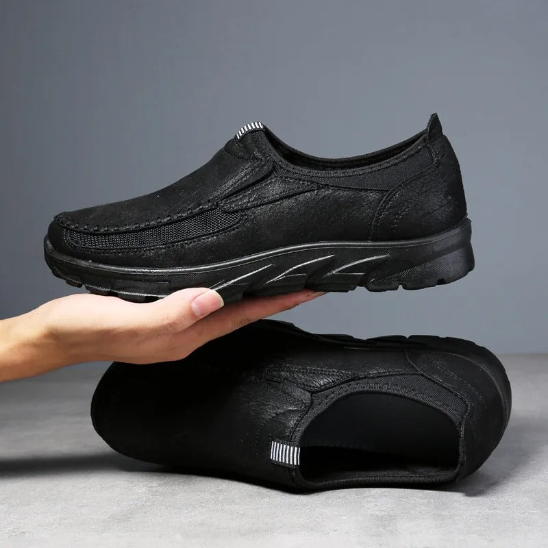 Gray men's slip-on loafers. Stylish & comfortable casual footwear with great traction for everyday use.