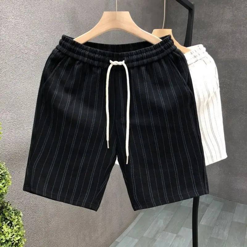 Men's black Torino pinstripe tailored shorts with an elastic waist & drawstring, perfect for versatile summer casual wear.