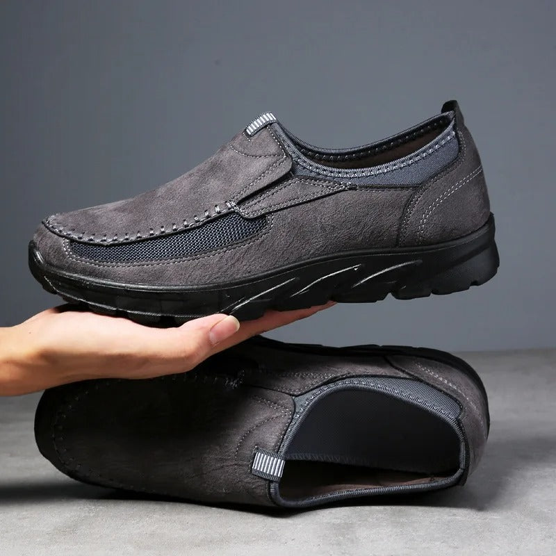 Mens sand slip-on comfort loafers. Breathable everyday casual footwear with a cushioned sole.