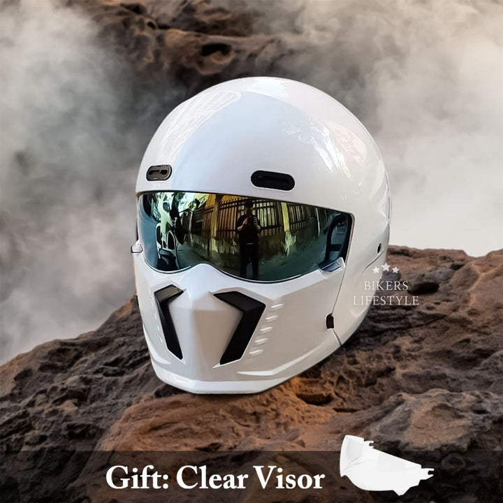 Rider wearing a matte black full face modular motorcycle helmet. Ensures maximum safety & comfort on the road.