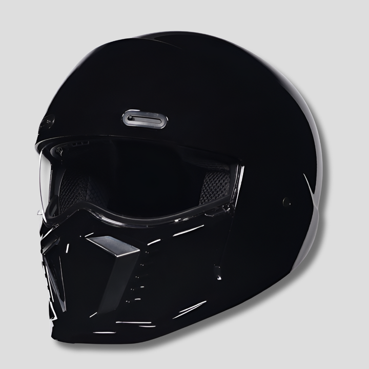 Close-up shot of a matte black full face modular motorcycle helmet. High-quality protective riding gear.