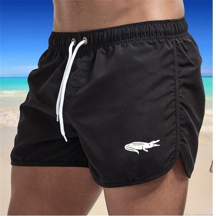 "Mehrfarbige, leichte Strand-Shorts mit elastischem Bund und modernem Druck, perfekt für Sommer und Sport."