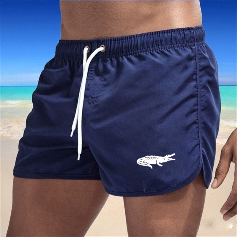 "Mehrfarbige, leichte Strand-Shorts mit elastischem Bund und modernem Druck, perfekt für Sommer und Sport."