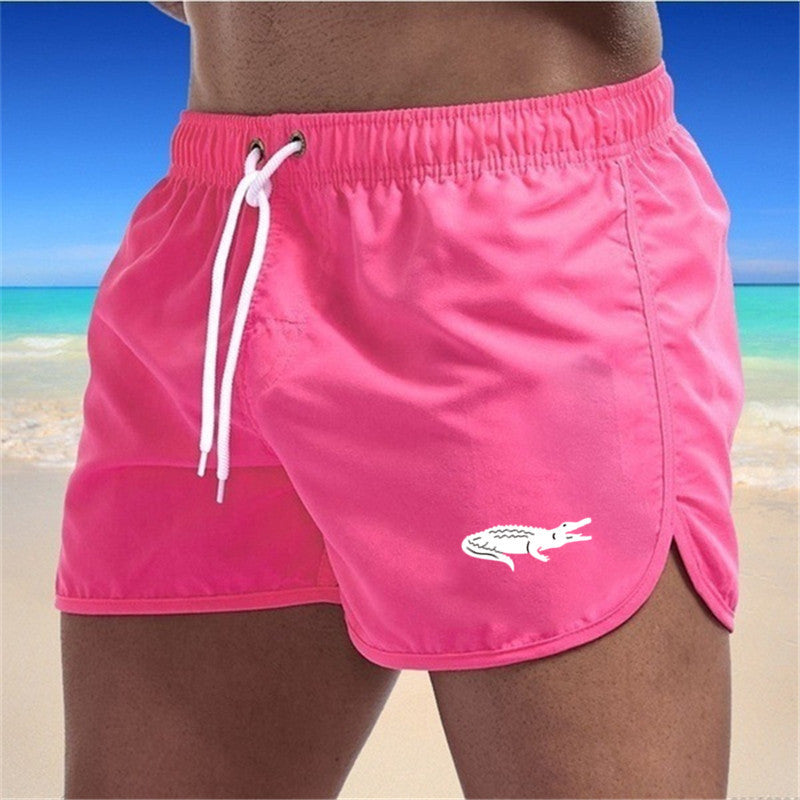 "Mehrfarbige, leichte Strand-Shorts mit elastischem Bund und modernem Druck, perfekt für Sommer und Sport."