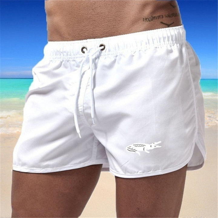 "Mehrfarbige, leichte Strand-Shorts mit elastischem Bund und modernem Druck, perfekt für Sommer und Sport."