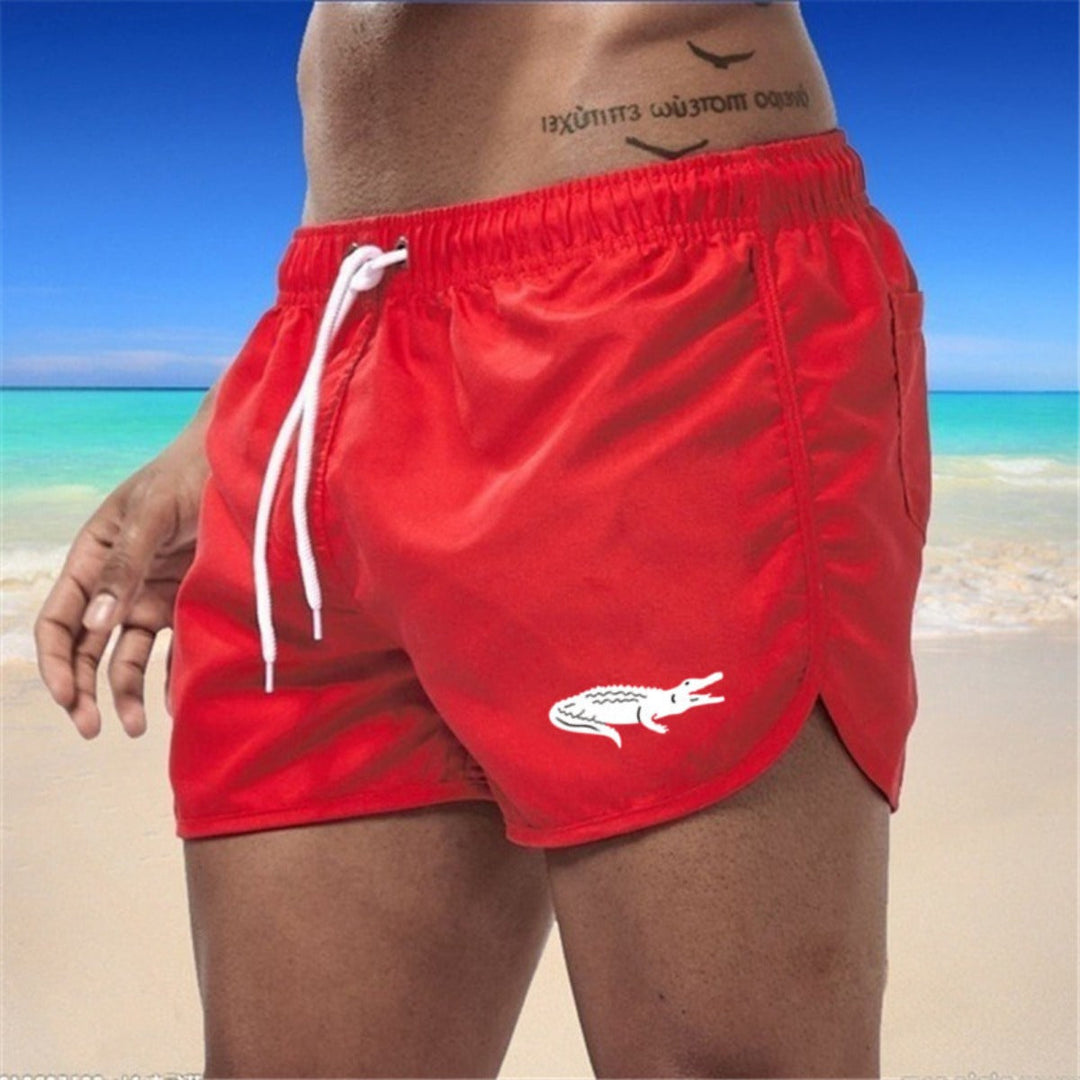 "Mehrfarbige, leichte Strand-Shorts mit elastischem Bund und modernem Druck, perfekt für Sommer und Sport."