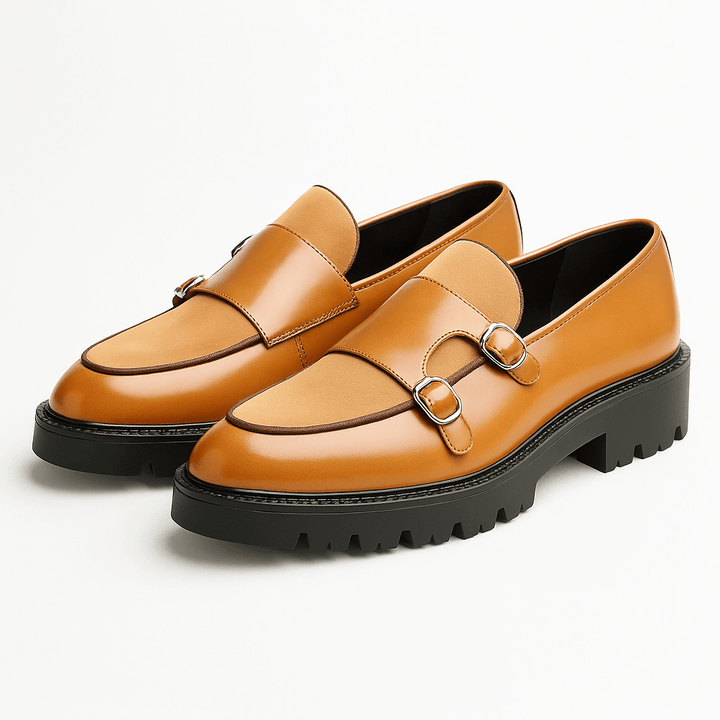 Classic men's brown leather monk strap dress shoes. Elegant buckled loafers for a refined, sophisticated appearance.