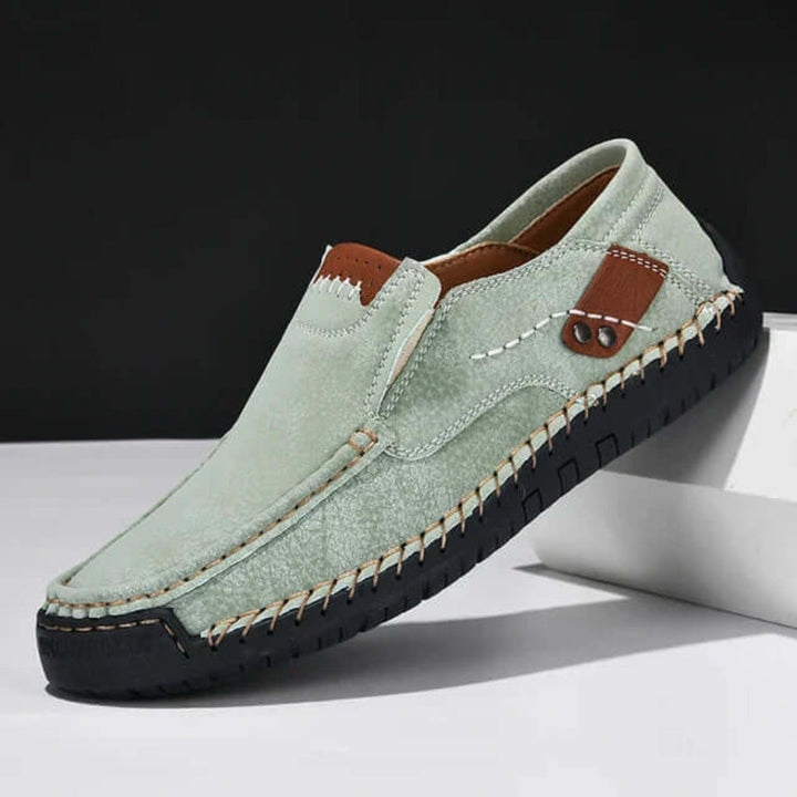 Stylish men's slip-on shoes for casual wear, featuring superior arch support & all-day comfort.