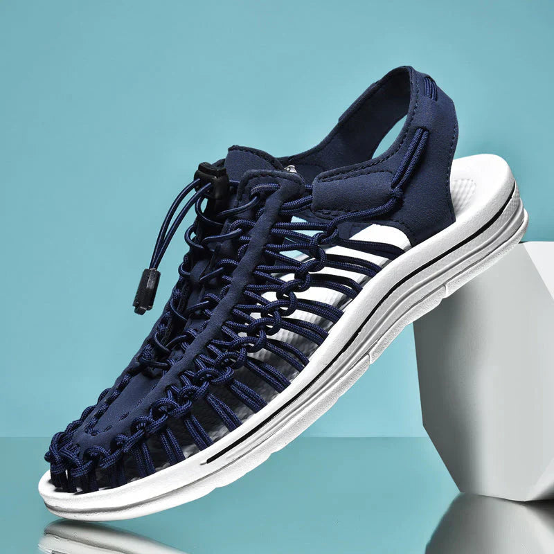 Comfortable men's closed-toe sandals with breathable design and adjustable fit for summer.