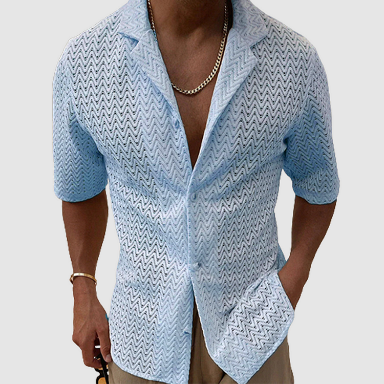 Close-up of men's open-weave shirt fabric, highlighting breathable texture & quality. Ideal for casual summer comfort.