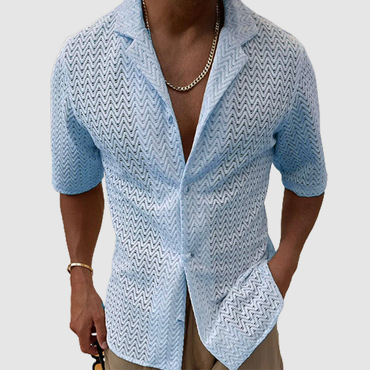 Close-up of men's open-weave shirt fabric, highlighting breathable texture & quality. Ideal for casual summer comfort.