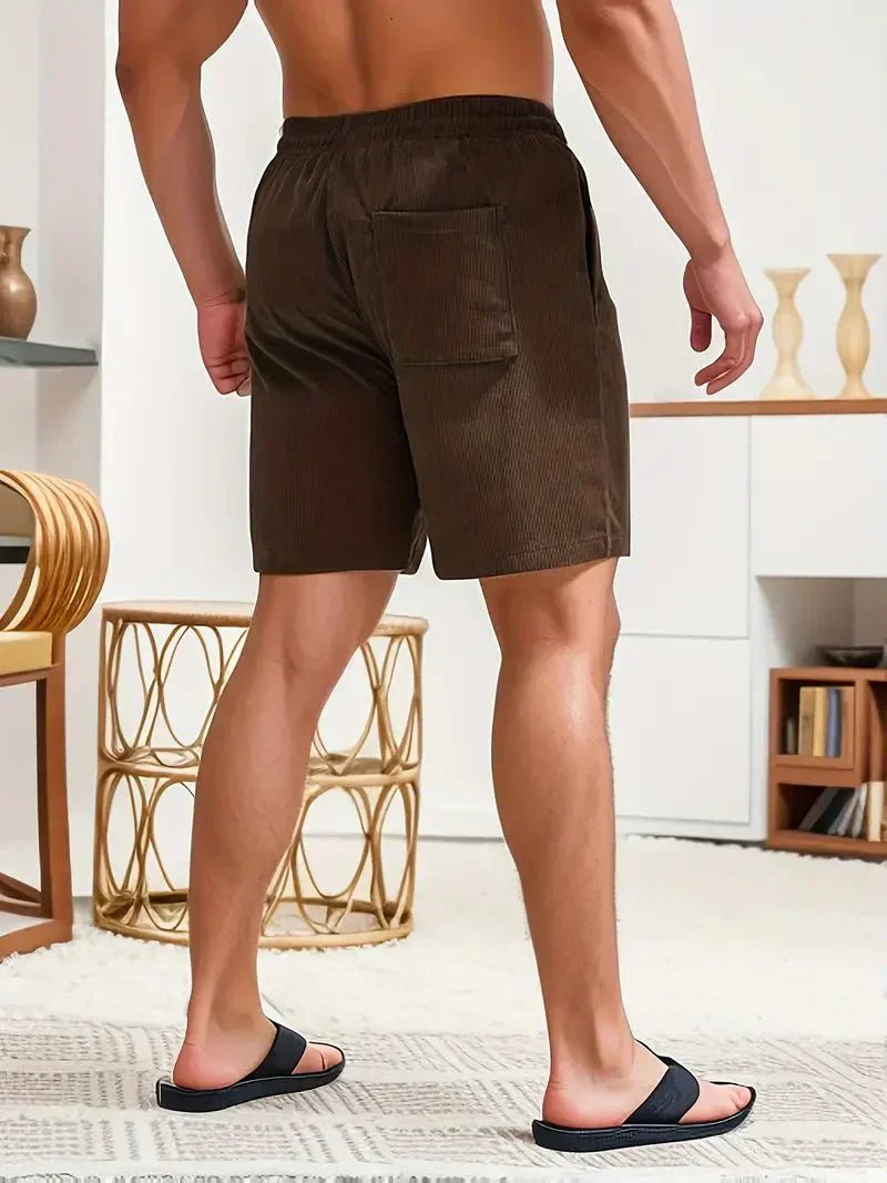 Men's casual shorts with adjustable drawstring, relaxed fit, great for warm weather activities.