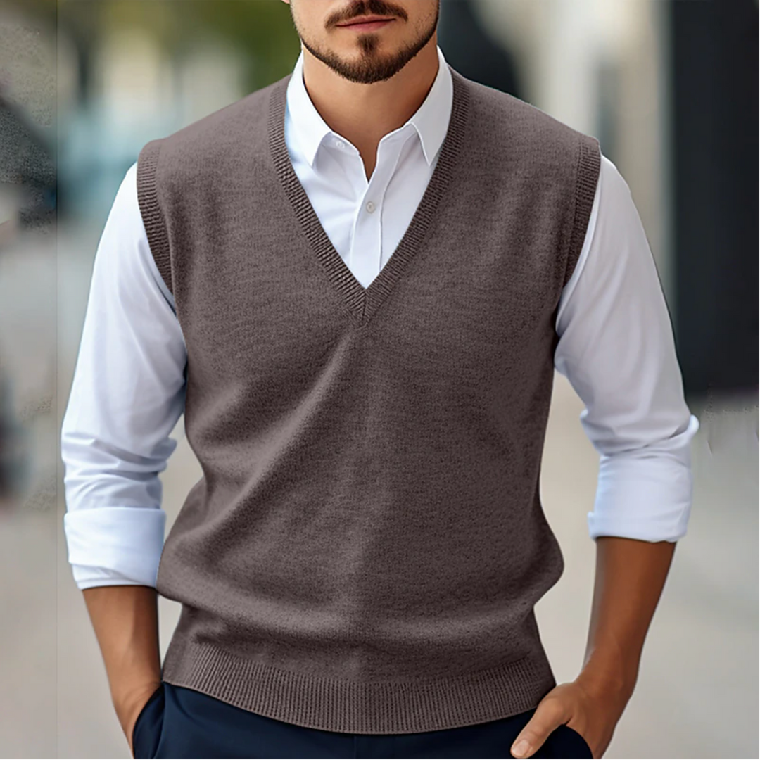Classic men's V-neck sweater vest in a comfortable, soft knit. Perfect sleeveless layering for smart casual looks.