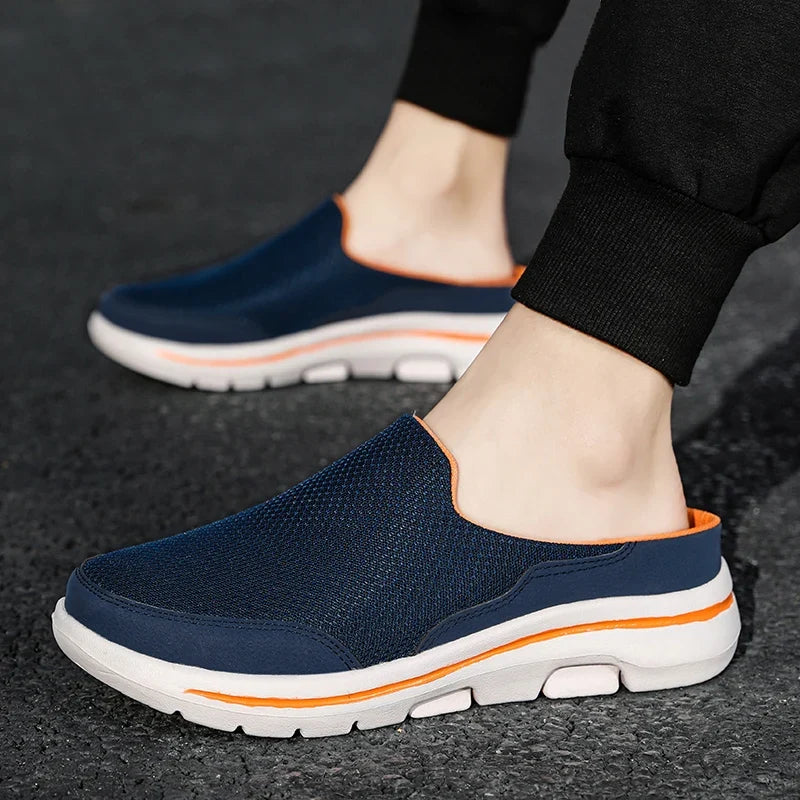 Men's closed-toe slip-on mule sandals for casual comfort and easy wear.
