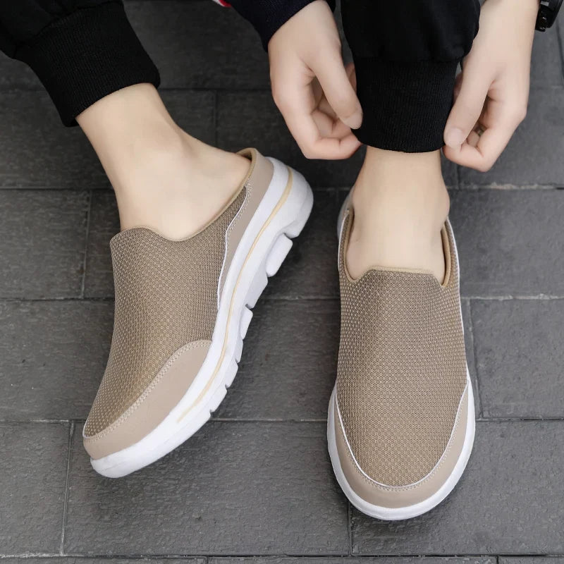 Comfortable men's closed-toe mules, slip-on design, perfect for casual summer footwear.