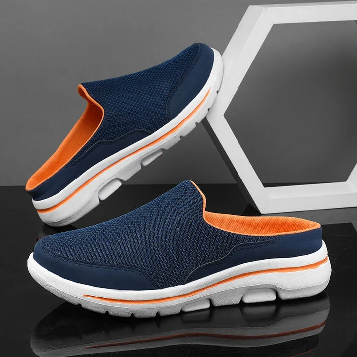 Modern men's slip-on closed-toe mules, durable sole, ultimate casual comfort footwear.