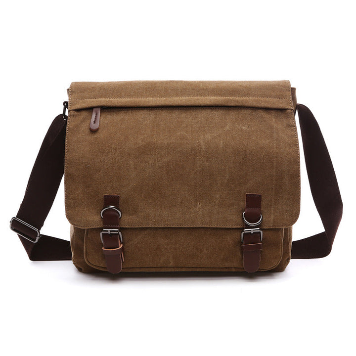 Rugged men's shoulder bag, a durable messenger for work & travel, featuring secure buckle straps for safety.