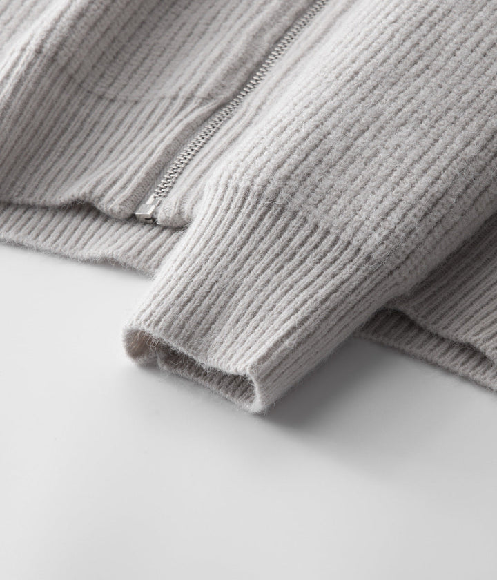 Side profile of a men's funnel neck zip-up sweater, demonstrating fit for casual & smart layering.