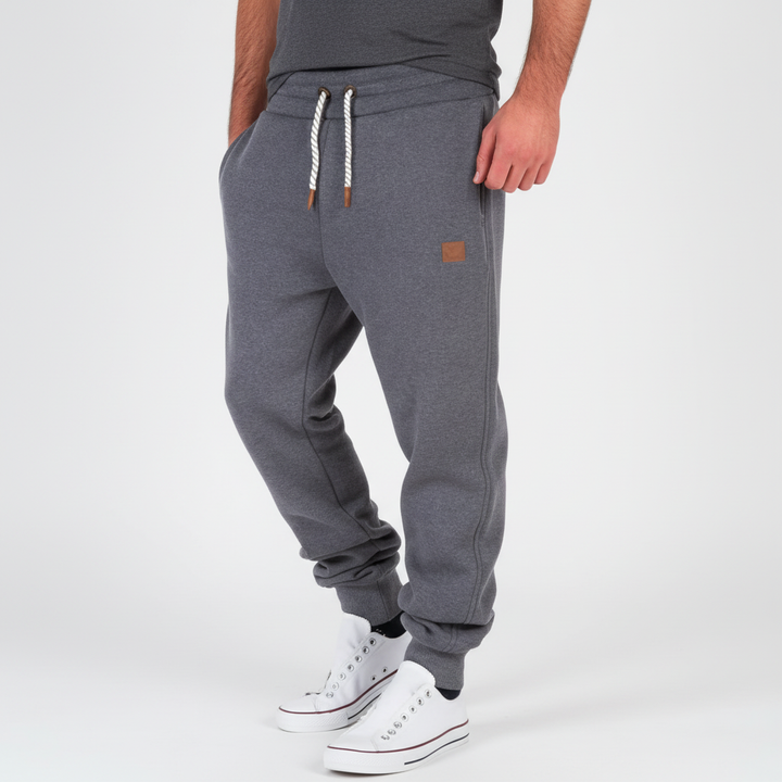 Men's Lance slim-fit joggers. Modern, comfortable activewear with elastic waist & pockets.