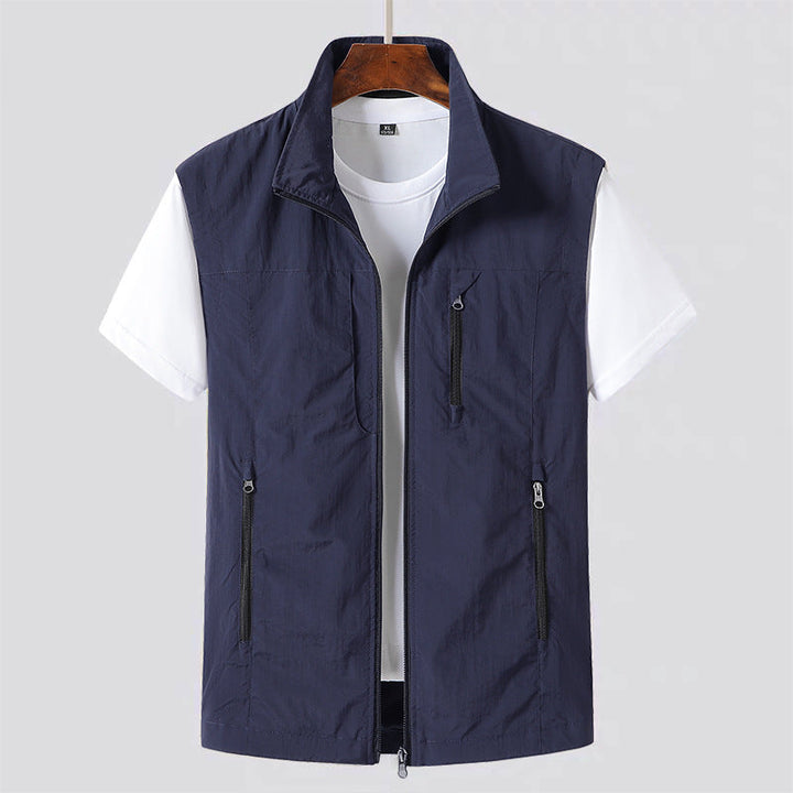 Stylish men's lightweight summer vest, a multi-pocket casual sleeveless jacket for everyday wear & travel.