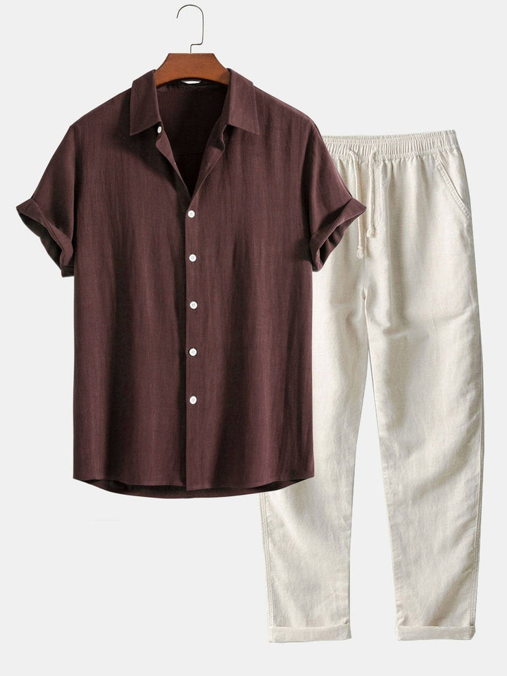 Full shot of a men's casual two-piece co-ord set with a band collar shirt and matching trousers.