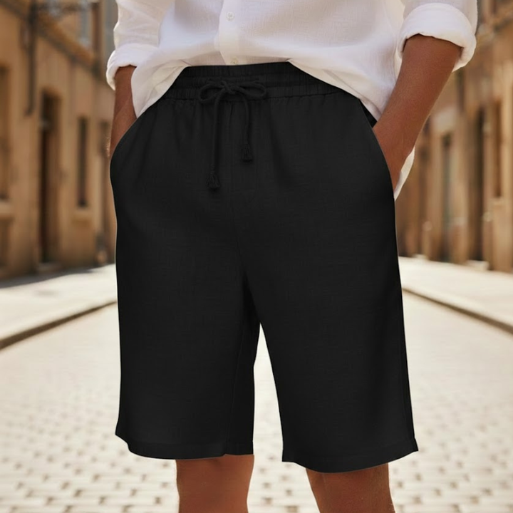 Lightweight men's relaxed fit shorts, featuring a drawstring waist for comfortable casual summer wear.