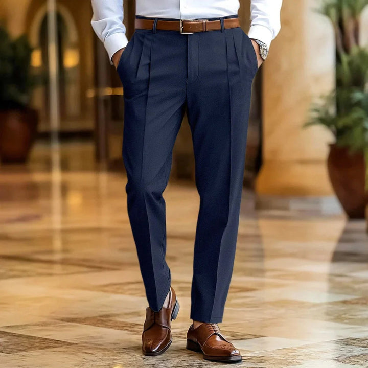 Men's relaxed fit summer trousers, versatile for casual or smart casual wear. Breathable and comfortable for warm weather.