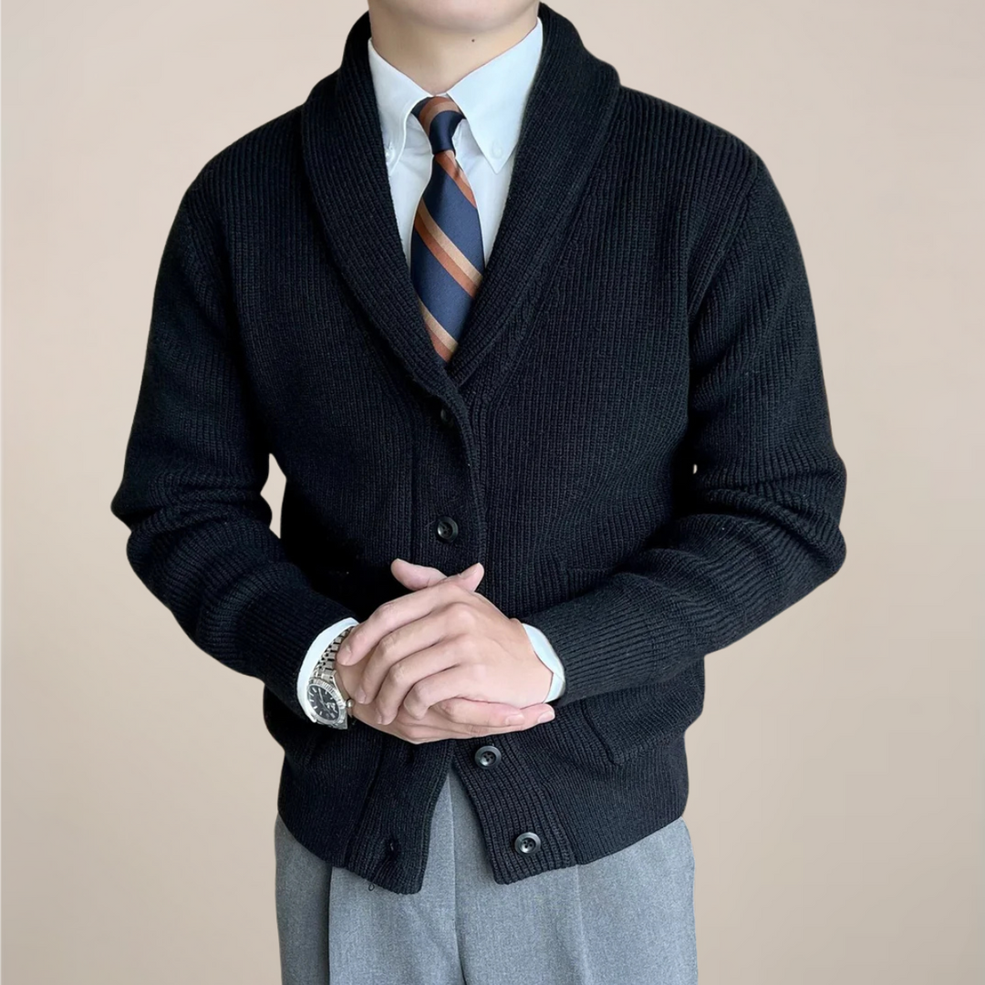 Stylish men's shawl collar cardigan sweater. Ideal for smart-casual winter fashion, offering warmth and timeless style.