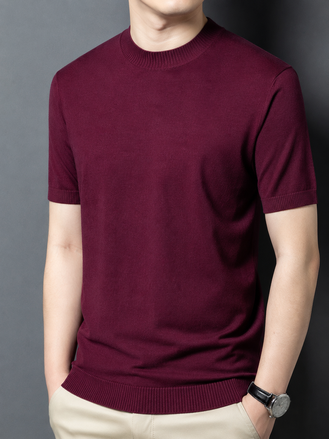 Breathable men's slim fit mock neck short sleeve t-shirt, ideal for warm weather.