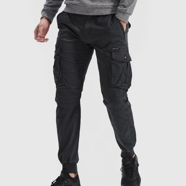 Stylish slim fit men's cargo joggers with tapered leg, perfect for urban fashion & comfort.