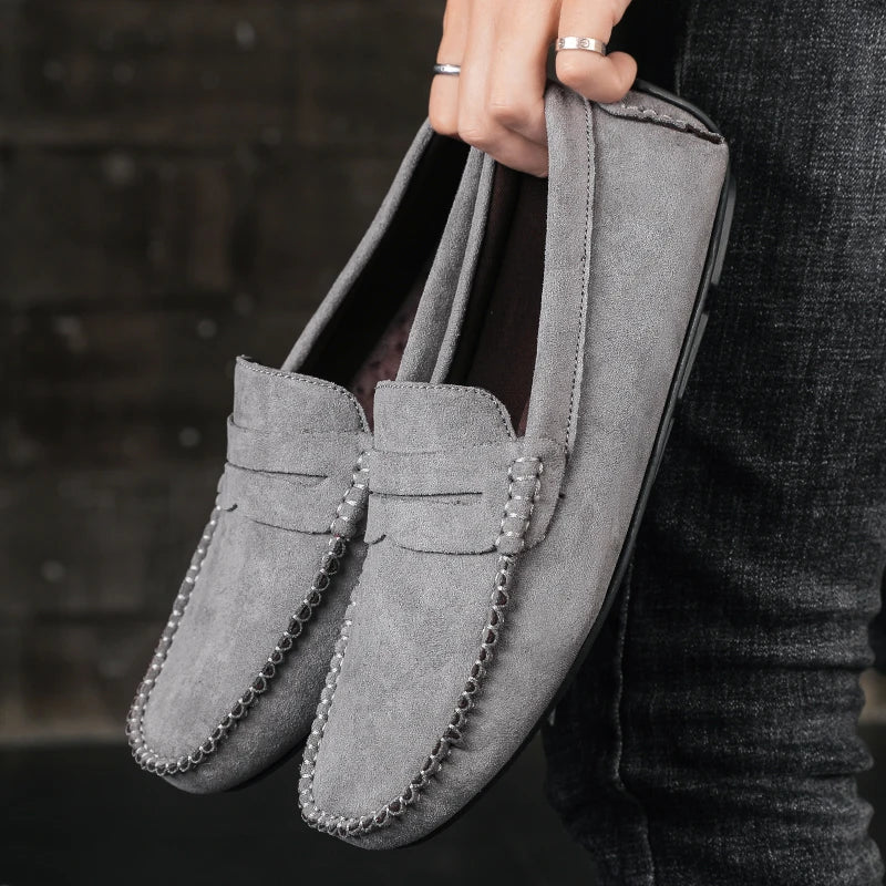 Elegant Men's Tivoli loafers with detailed stitching, comfortable and versatile slip-on men's footwear.