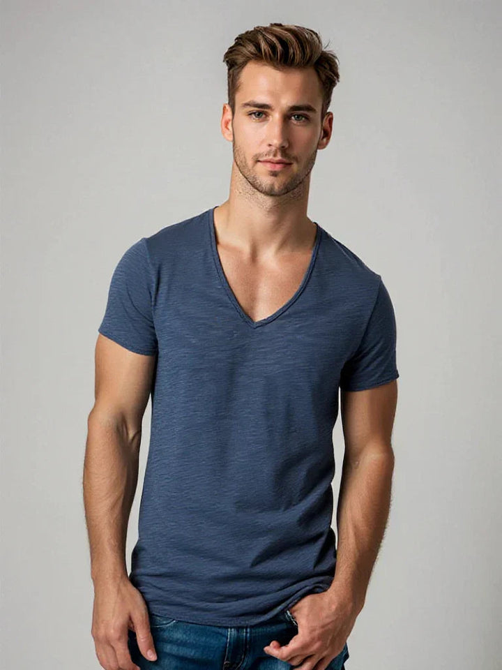 Men's V-Neck T-Shirt in a solid color, perfect for breathable, versatile everyday wear. Comfortable short sleeve top.