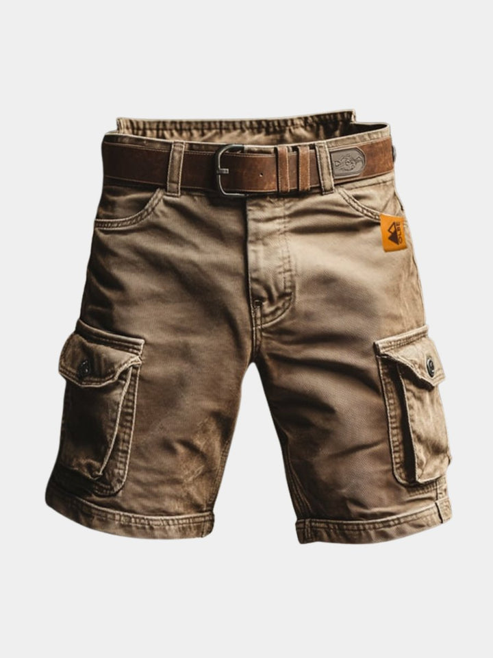Men's vintage cargo shorts in rugged style with multiple utility pockets for casual wear & outdoor adventures.