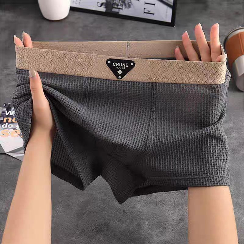 Relaxed fit men's waffle knit boxer shorts, ideal for home wear and layering.