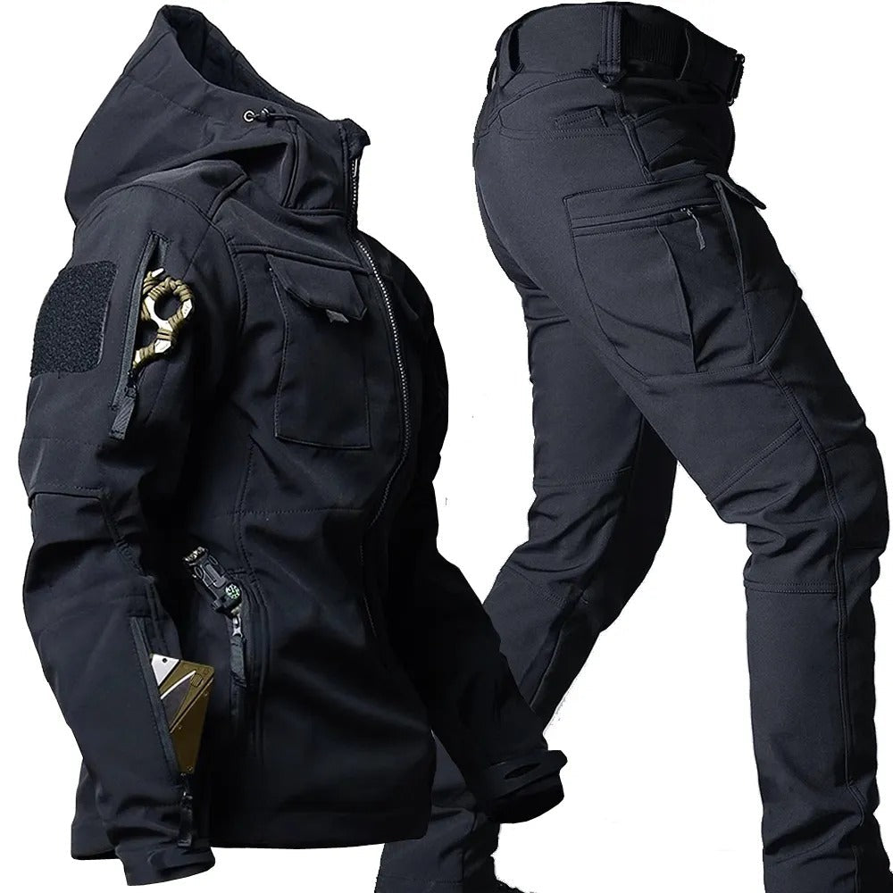 Black men's waterproof outdoor jacket and pants set for hiking, trekking & all-weather adventures.