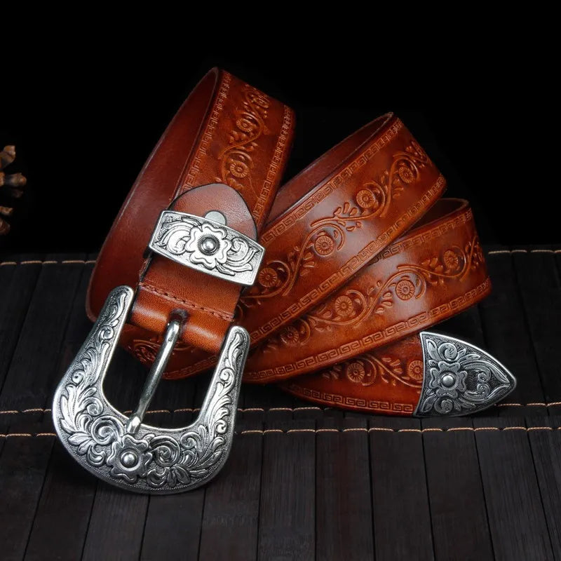Men's engraved western leather belt with a detailed metal buckle, perfect for classic cowboy style.