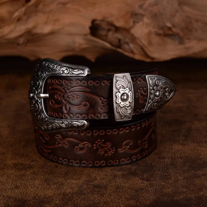 Rustic men's western belt, vintage engraved design, durable leather, stylish metal buckle for cowboys.