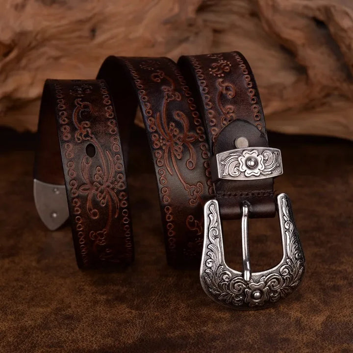 Full view of a men's vintage style engraved western belt, featuring a sturdy metal buckle, ideal for rustic looks.