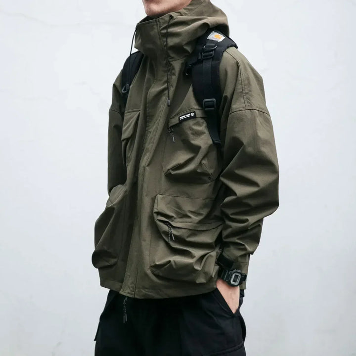 Casual men's zip-up hooded windbreaker. Lightweight, multi-pocket design perfect for outdoor wear & active lifestyles.
