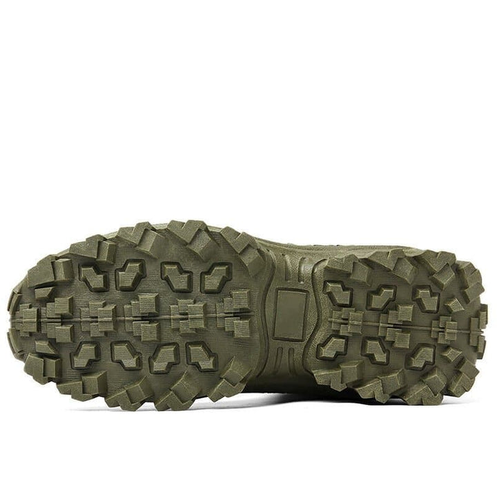 Outdoor men's work boots, rugged and tactical, designed for hiking with superior grip.