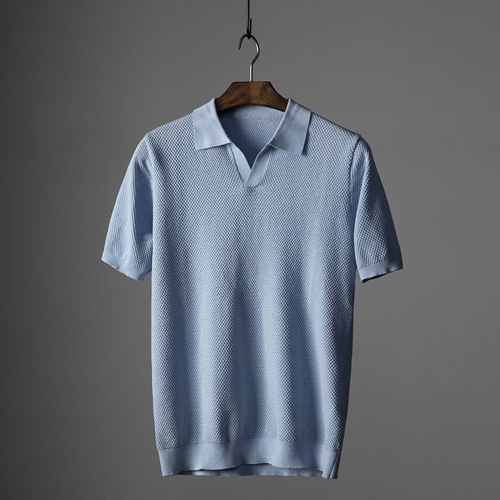 Versatile men's short sleeve polo shirt with unique texture, ideal for casual & smart casual.