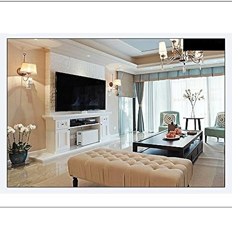 Compact 1080P wireless WiFi security camera discreetly monitoring an indoor home living space.